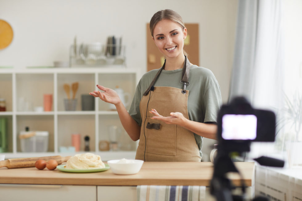 woman teaching to cook online